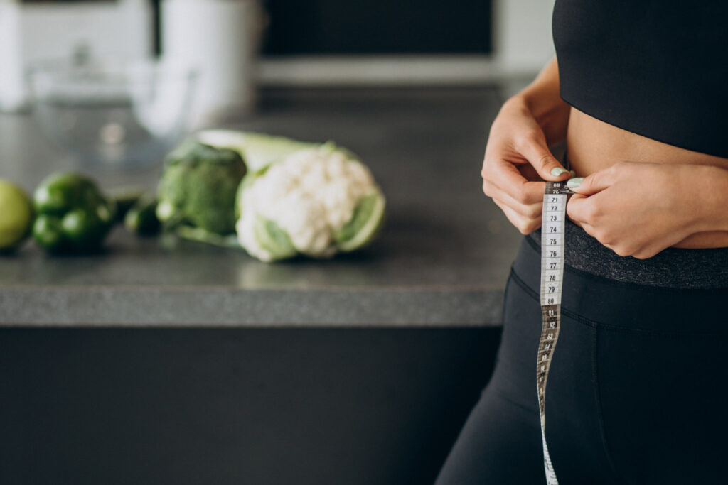 woman measuring weight